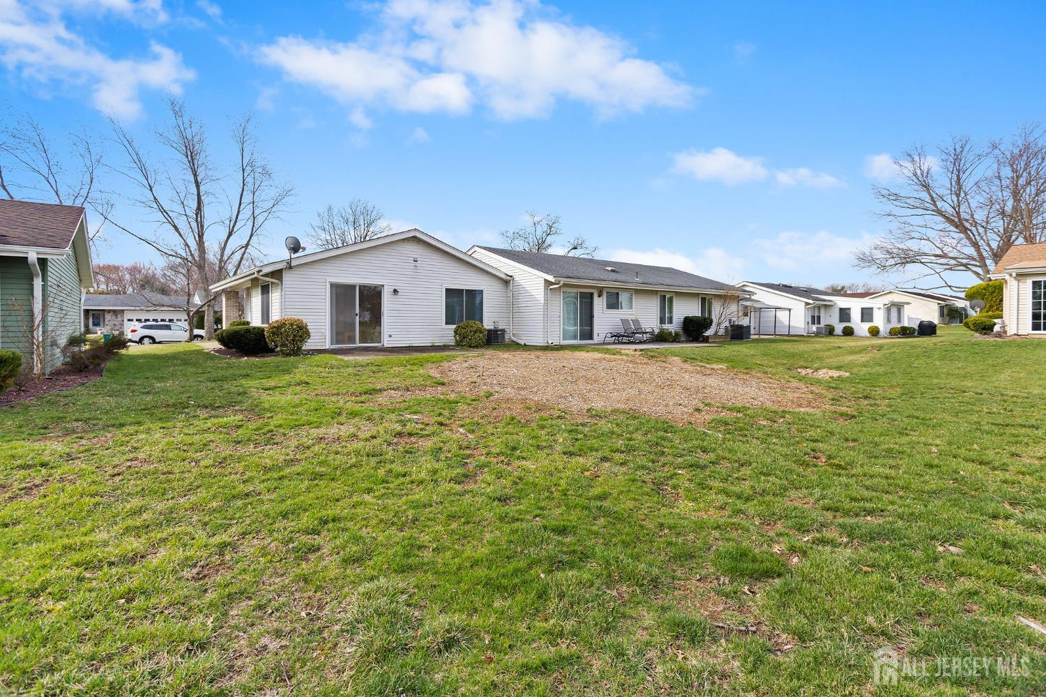 274 Convent Road, Unit D Monroe Township, NJ 08831 - Photo 12 of 12 a front view of a house with a yard