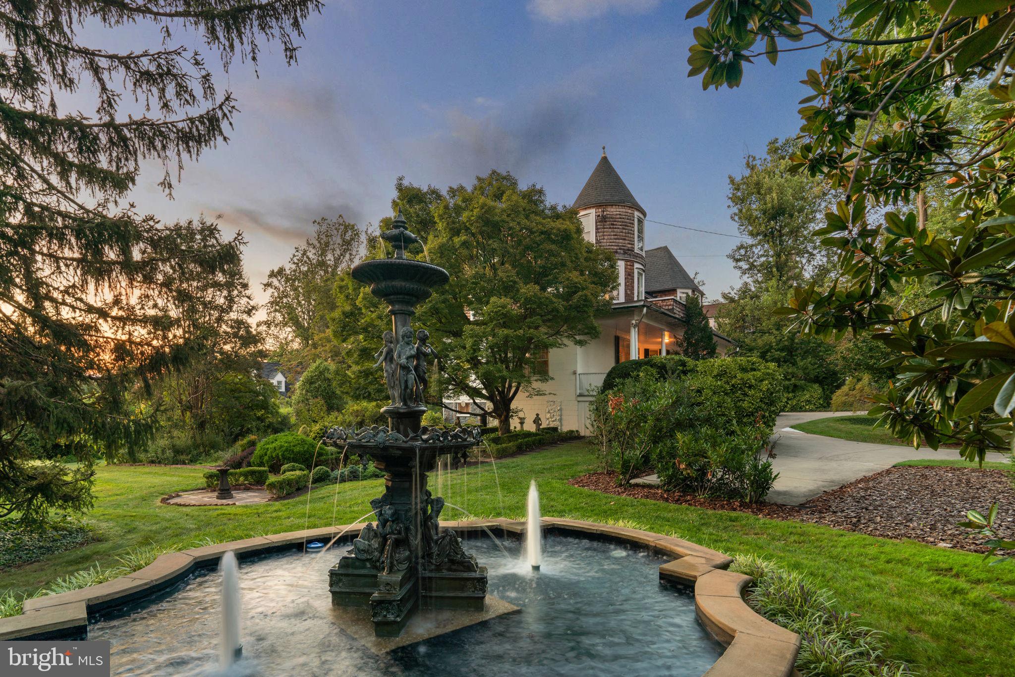 100 North Rolling Road Baltimore, MD 21228 - Photo 3 of 74 a view of a park with plants and large trees