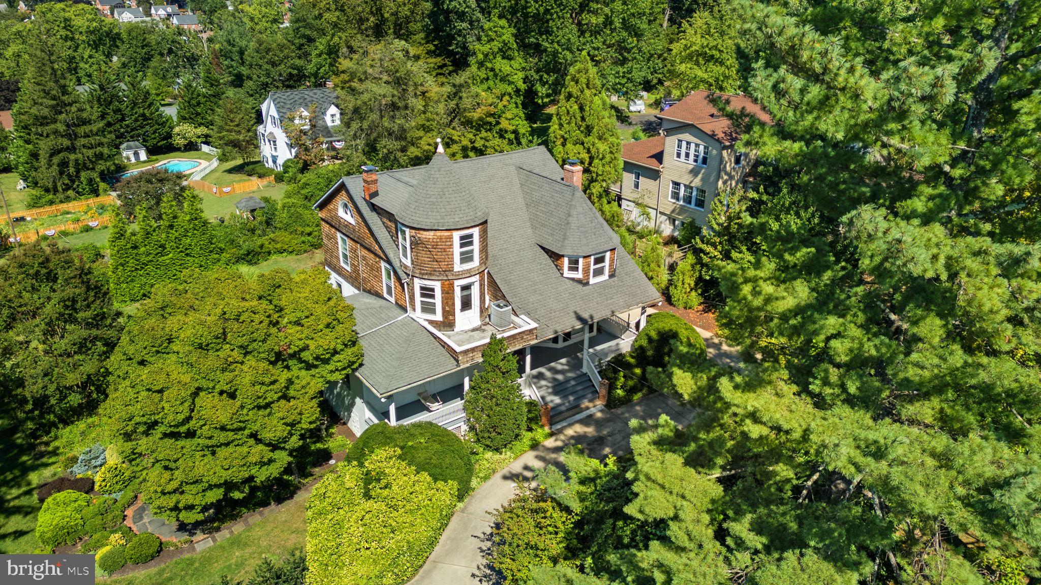 100 North Rolling Road Baltimore, MD 21228 - Photo 63 of 74 an aerial view of a house with a yard