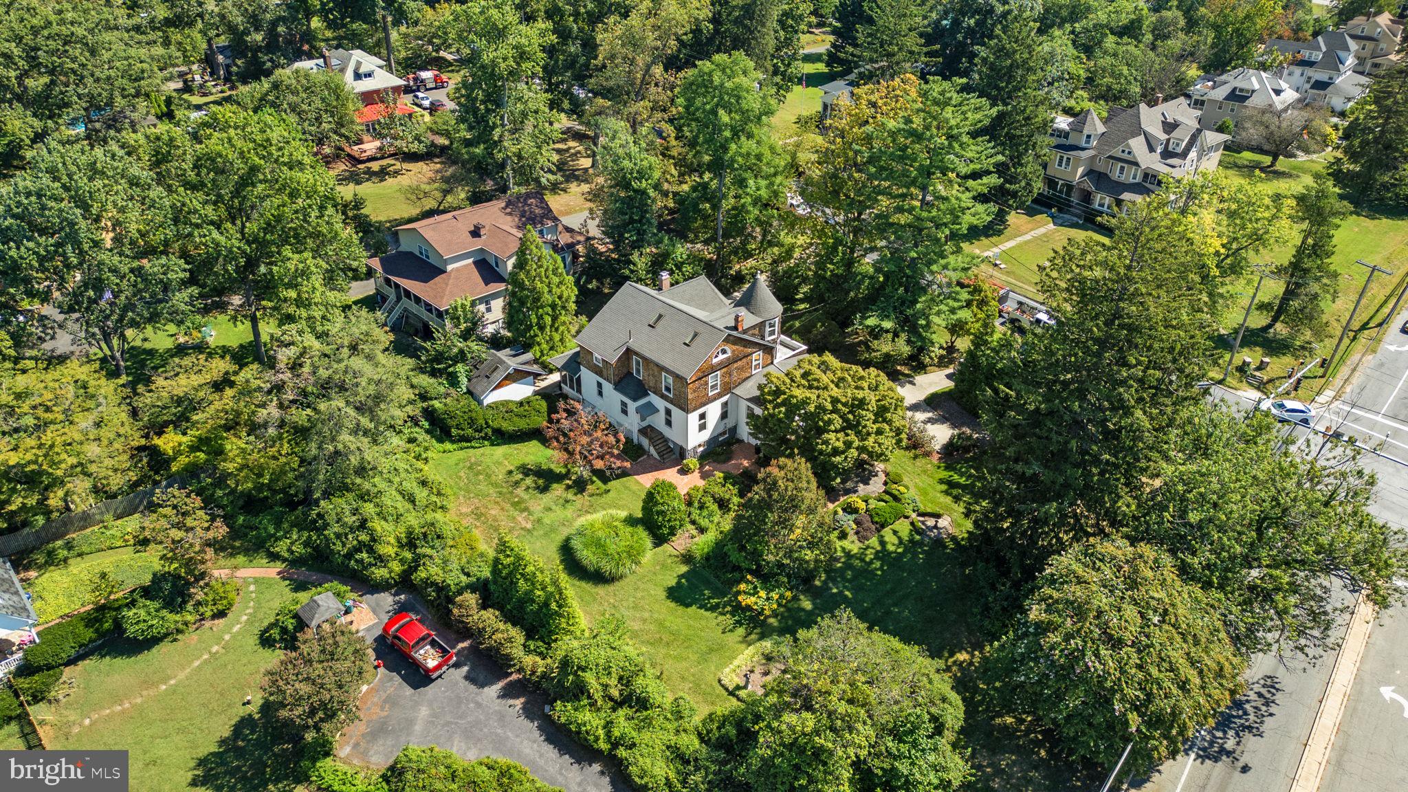 100 North Rolling Road Baltimore, MD 21228 - Photo 66 of 74 an aerial view of residential house with outdoor space and trees all around