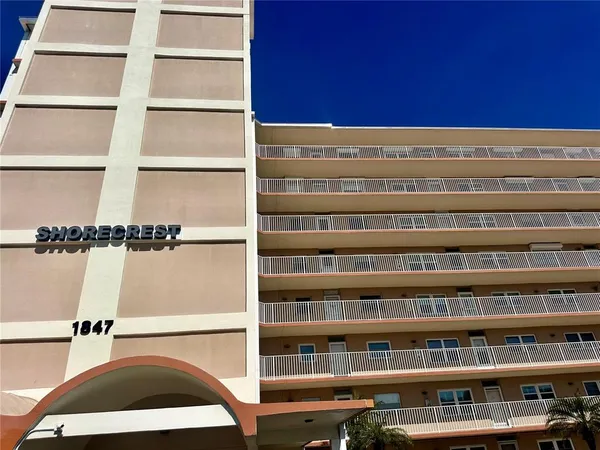 a view of a large building with a balcony