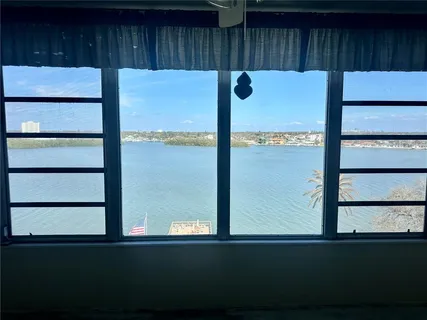 a view of outdoor space with seating area and hardwood
