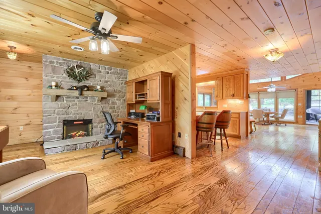 a kitchen with stainless steel appliances granite countertop a sink and a window