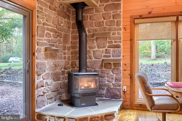a bathroom with a toilet a sink and a mirror