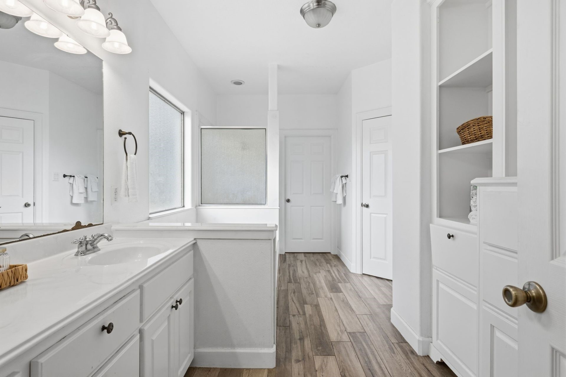 20407 Deer Run Road Damon, TX 77430 - Photo 13 of 29 a bathroom with a sink mirror and shower