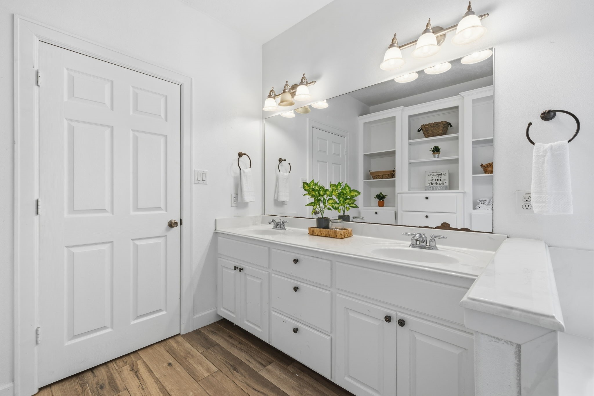 20407 Deer Run Road Damon, TX 77430 - Photo 17 of 29 a bathroom with a double vanity sink and a mirror