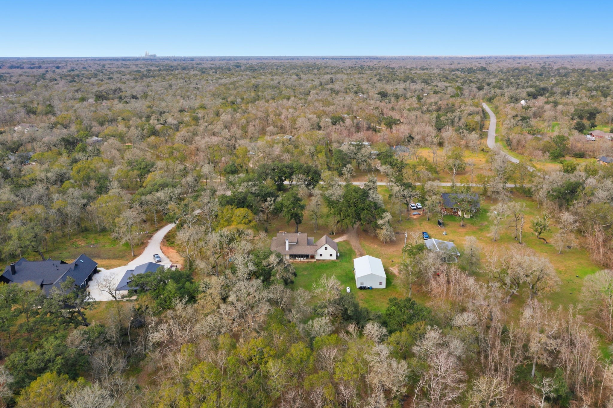20407 Deer Run Road Damon, TX 77430 - Photo 28 of 29 an aerial view of residential houses with outdoor space