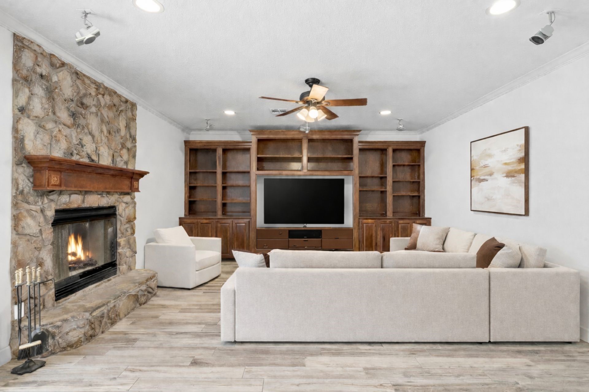 20407 Deer Run Road Damon, TX 77430 - Photo 5 of 29 a living room with furniture and a fireplace