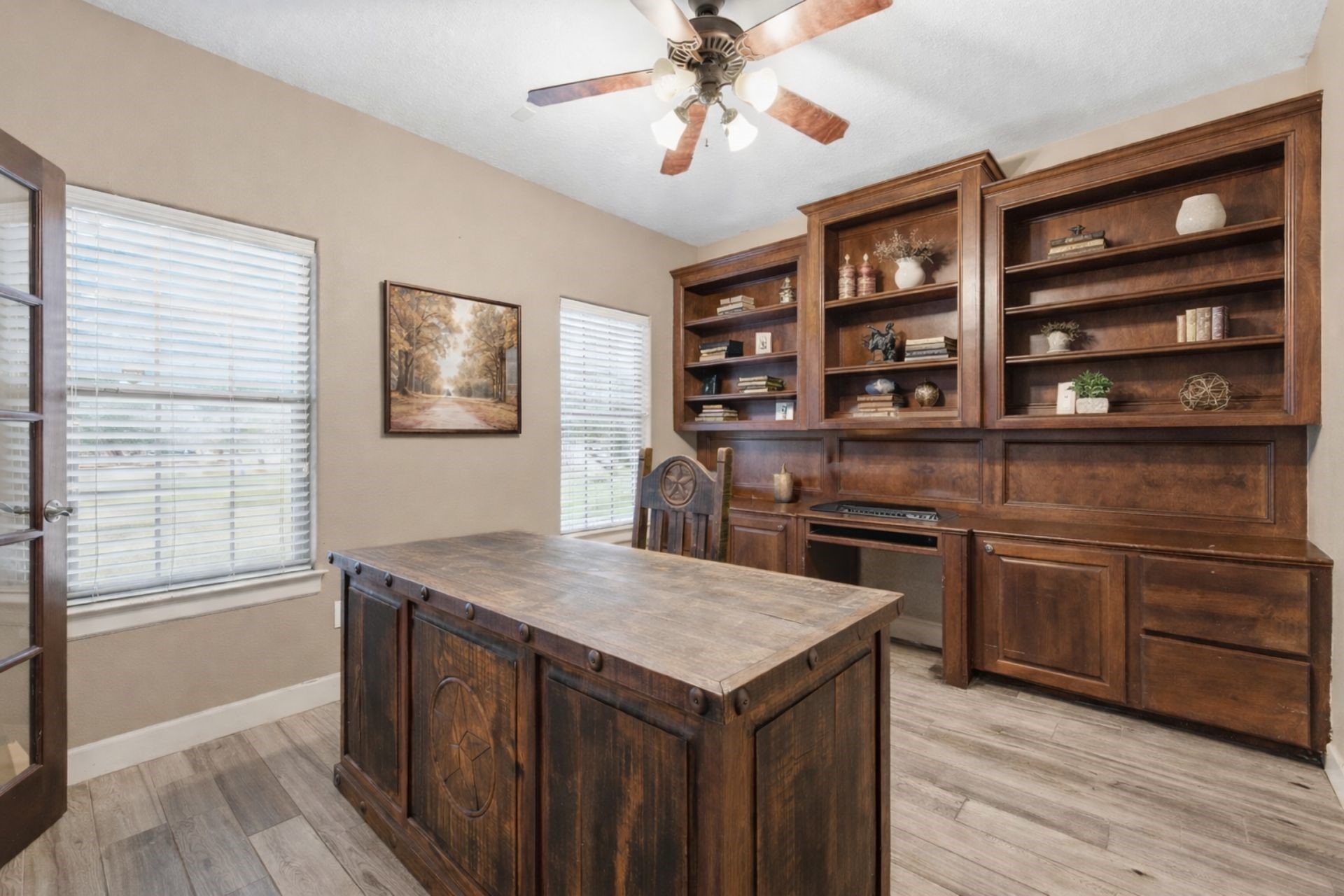 20407 Deer Run Road Damon, TX 77430 - Photo 9 of 29 a kitchen with a stove a sink and cabinets