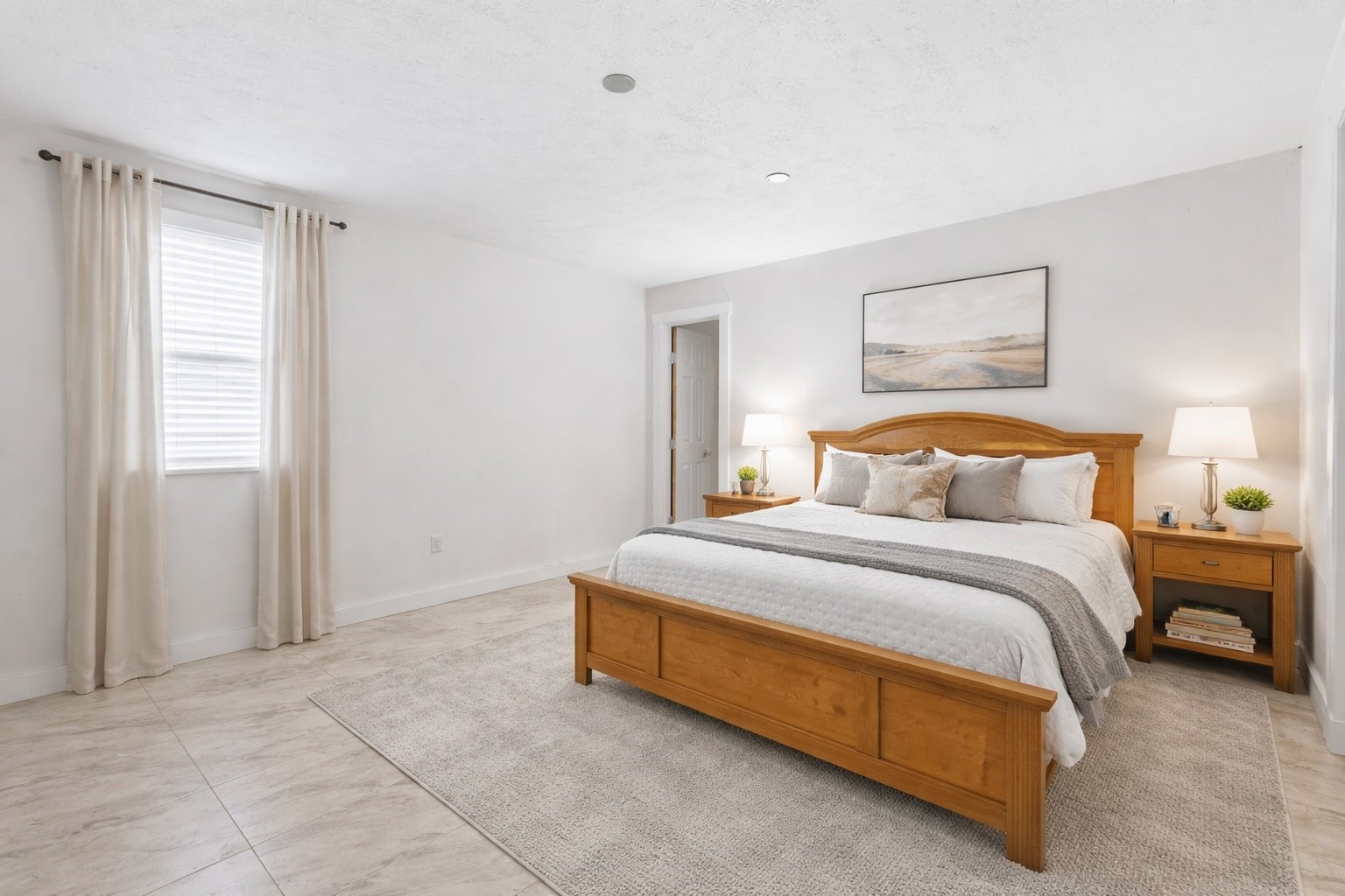 20407 Deer Run Road Damon, TX 77430 - Photo 10 of 29 a spacious bedroom with a bed and a window