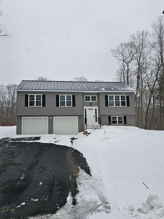 123 Keys Road Warren, MA 01585 - Photo 1 of 12 a front view of a house with a yard