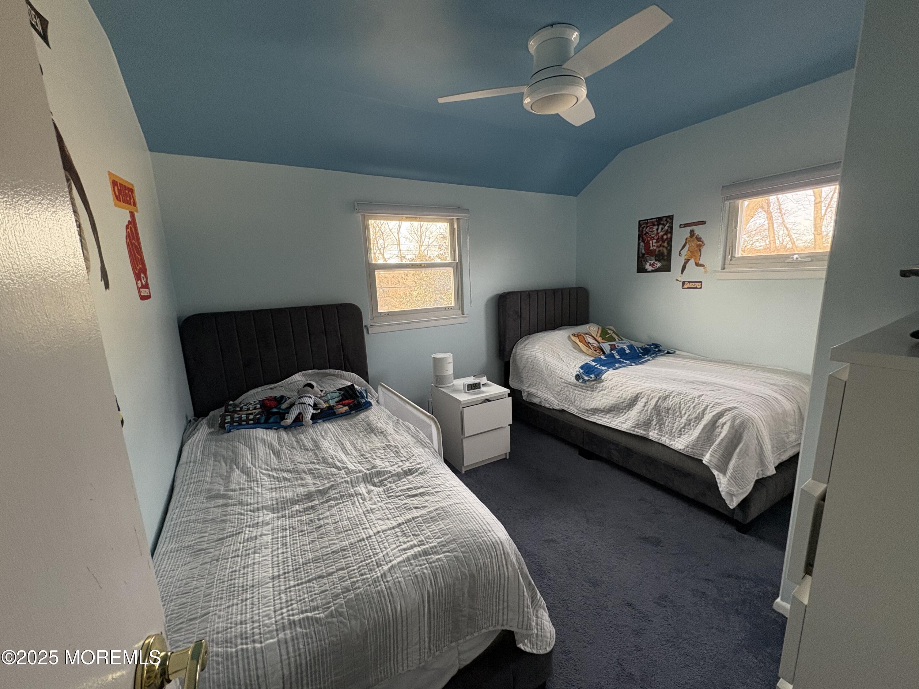 7 Peach Tree Road Oakhurst, NJ 07755 - Photo 13 of 21 a bedroom with a bed and a window