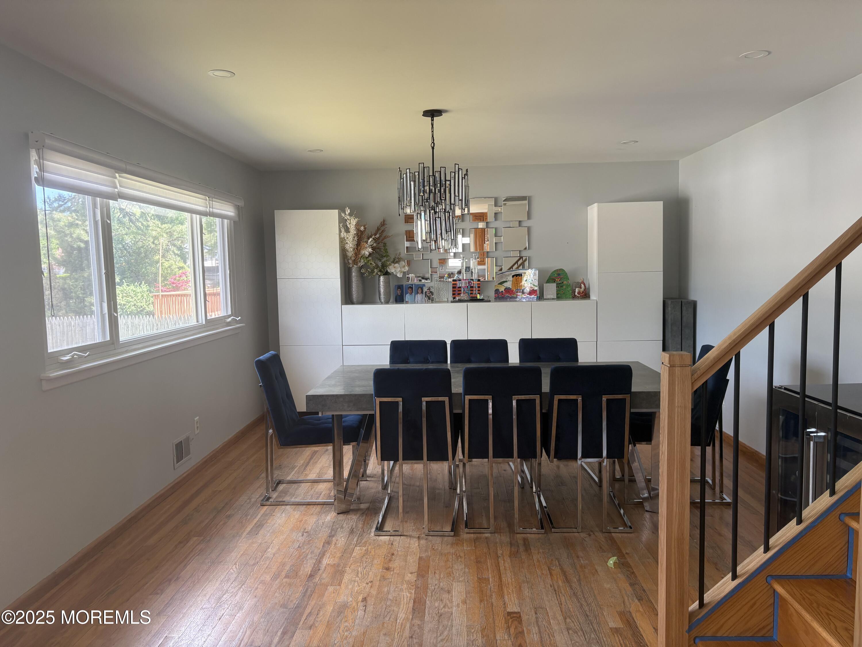 7 Peach Tree Road Oakhurst, NJ 07755 - Photo 21 of 21 a view of a dining room with furniture window and wooden floor