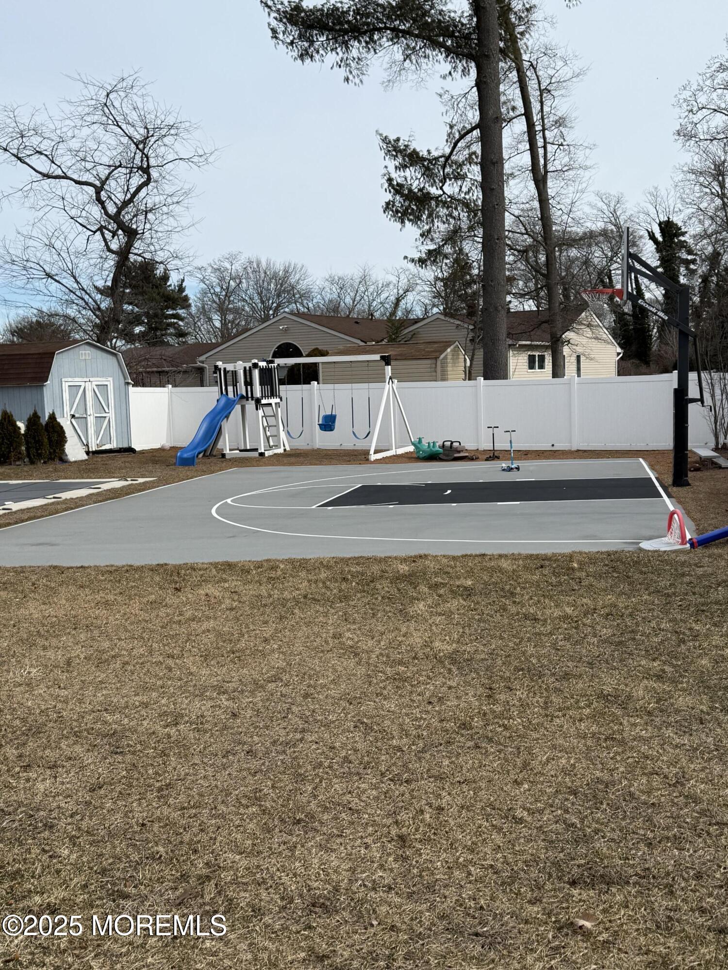 7 Peach Tree Road Oakhurst, NJ 07755 - Photo 7 of 21 a view of a house with a yard and tree s