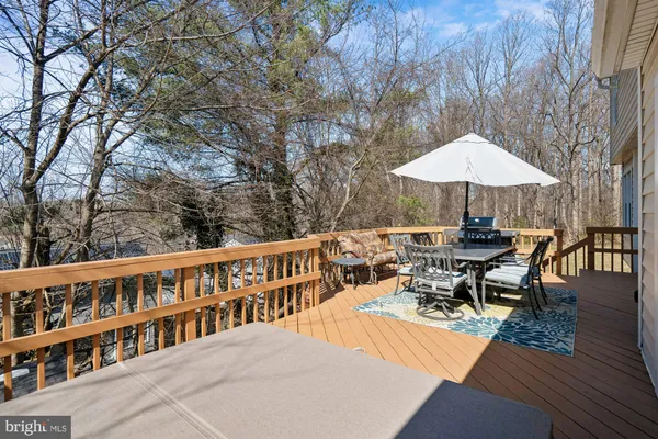a bathroom with a double vanity sink mirror and shower