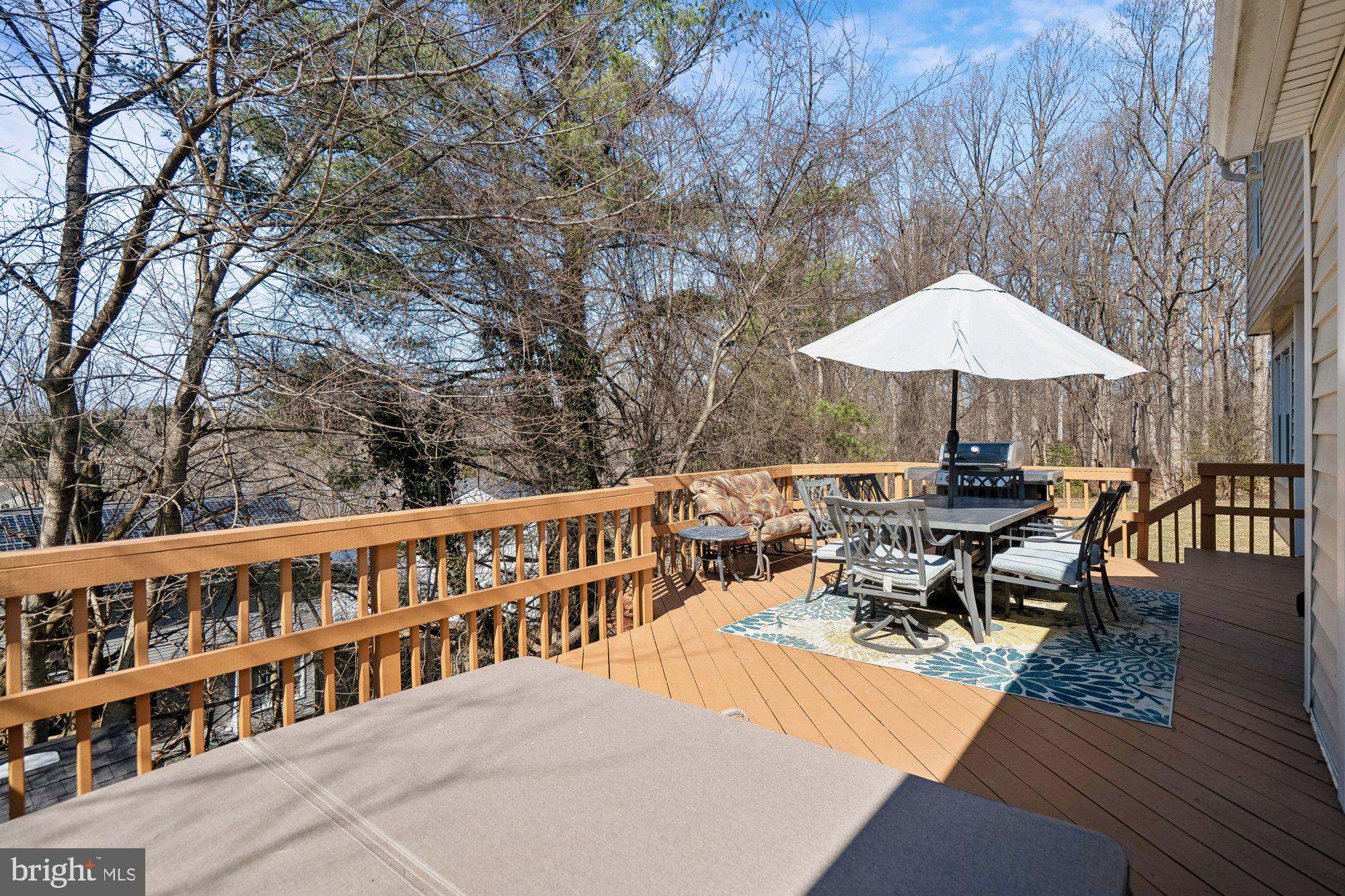 13525 Winding Trail Court Silver Spring, MD 20906 - Photo 17 of 40 a view of a patio with furniture and a yard