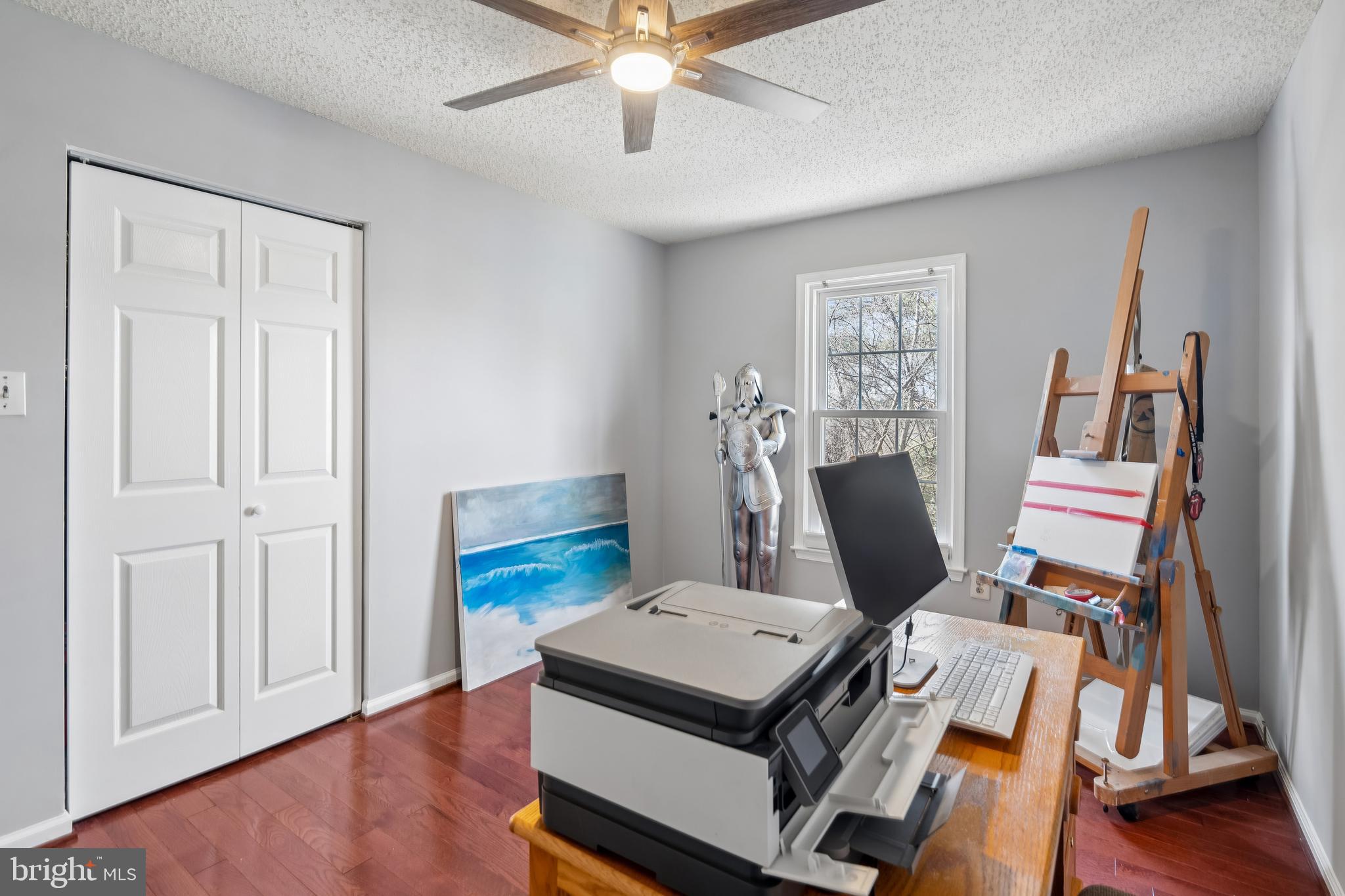 13525 Winding Trail Court Silver Spring, MD 20906 - Photo 23 of 40 a view of a workspace with furniture and wooden floor