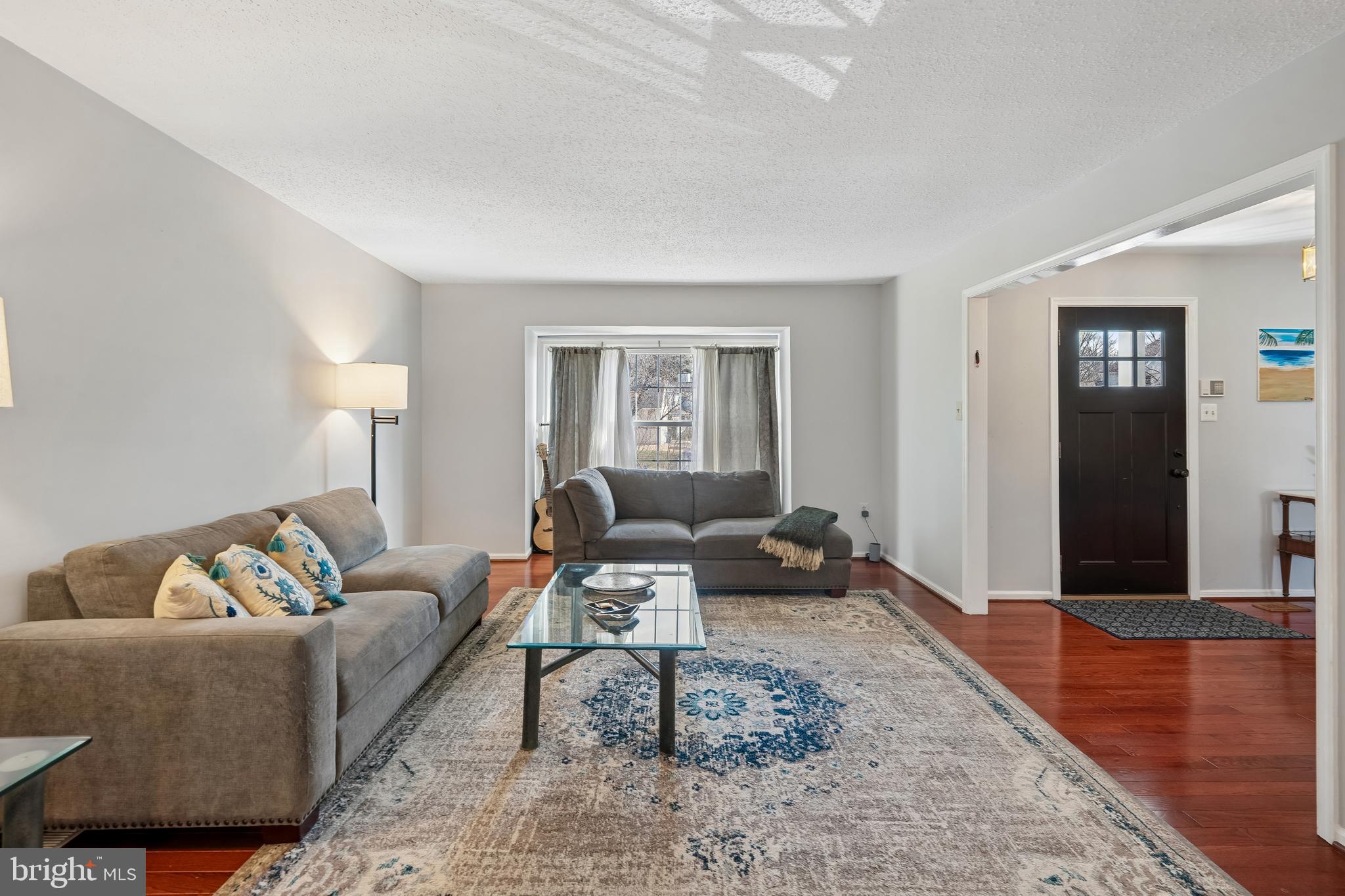 13525 Winding Trail Court Silver Spring, MD 20906 - Photo 6 of 40 a living room with furniture and wooden floor