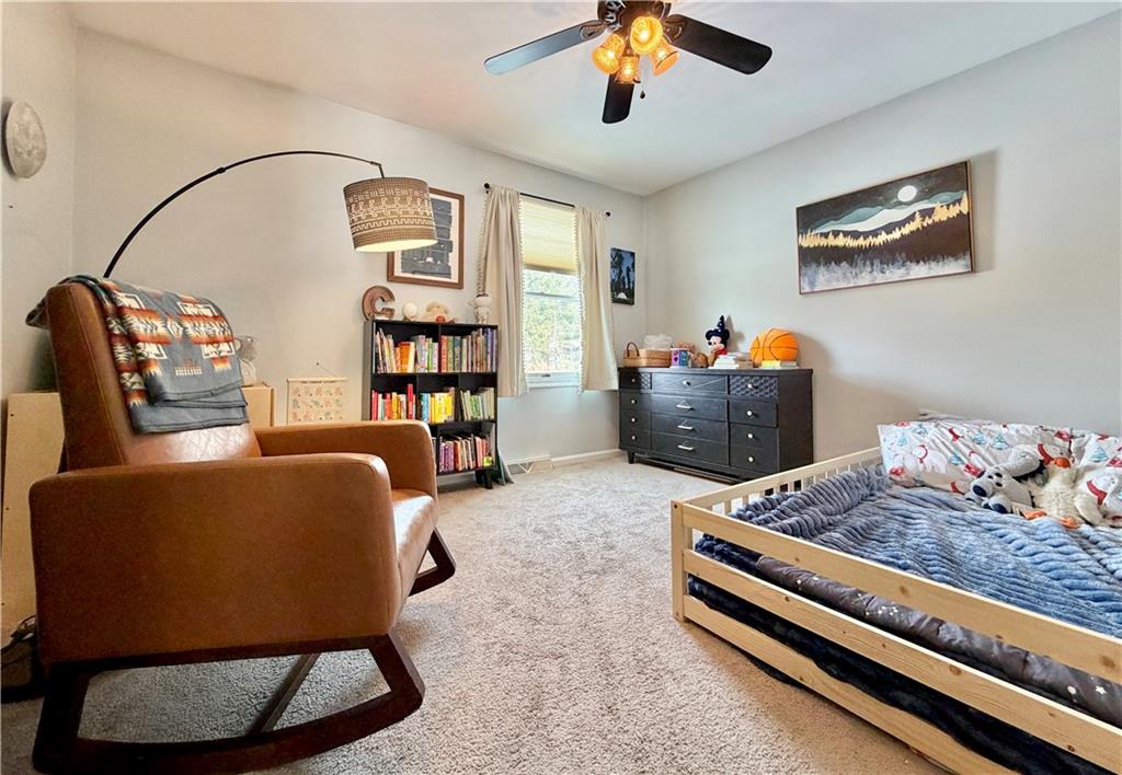 110 West McQuistion Road Butler, PA 16001 - Photo 13 of 32 a living room with furniture and a window