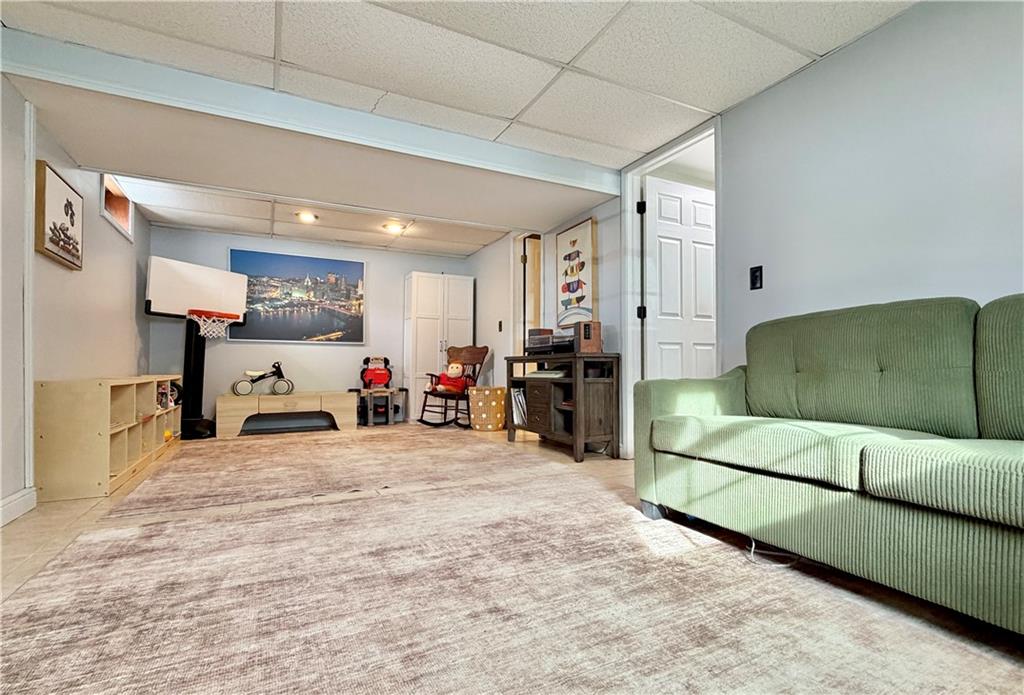 110 West McQuistion Road Butler, PA 16001 - Photo 16 of 32 a living room with furniture and a large window