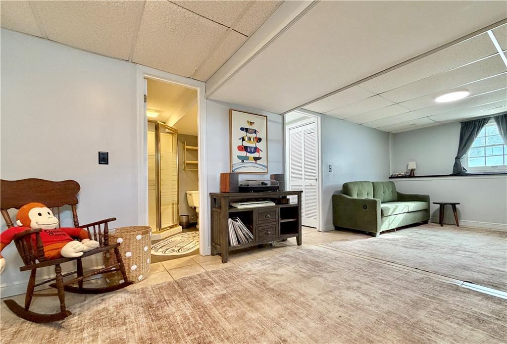 110 West McQuistion Road Butler, PA 16001 - Photo 18 of 32 a living room with furniture and a wooden floor