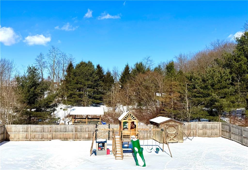 110 West McQuistion Road Butler, PA 16001 - Photo 25 of 32 a view of outdoor space with swimming pool and trees in the background