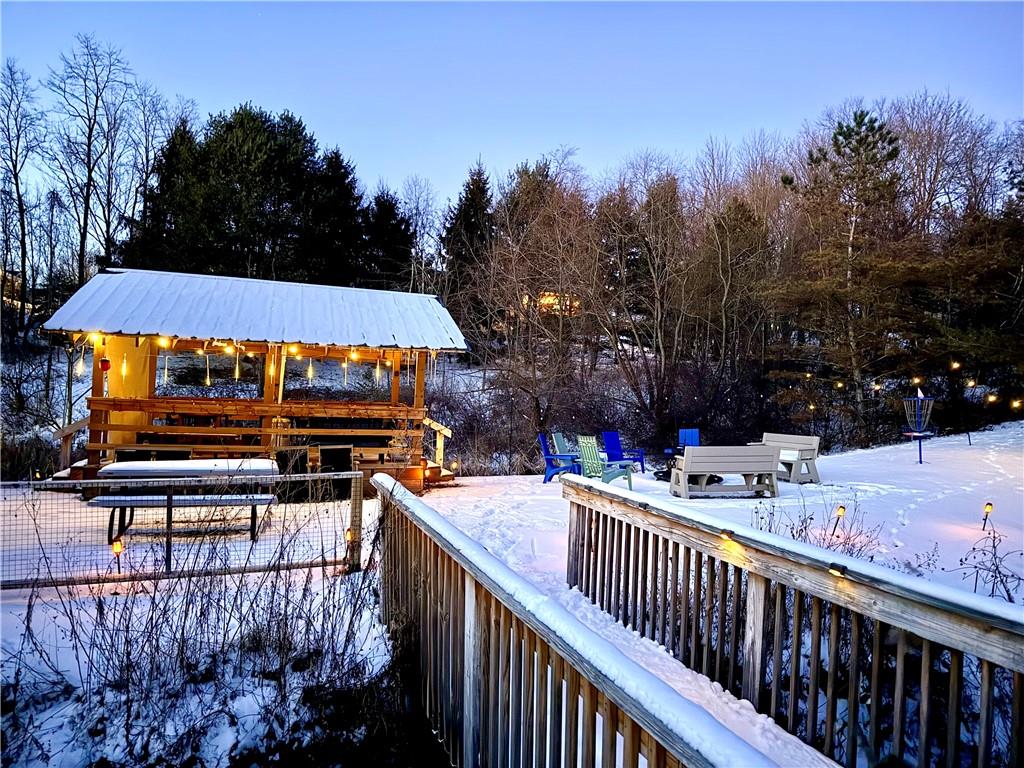 110 West McQuistion Road Butler, PA 16001 - Photo 26 of 32 a view of a roof deck with wooden fence and floor