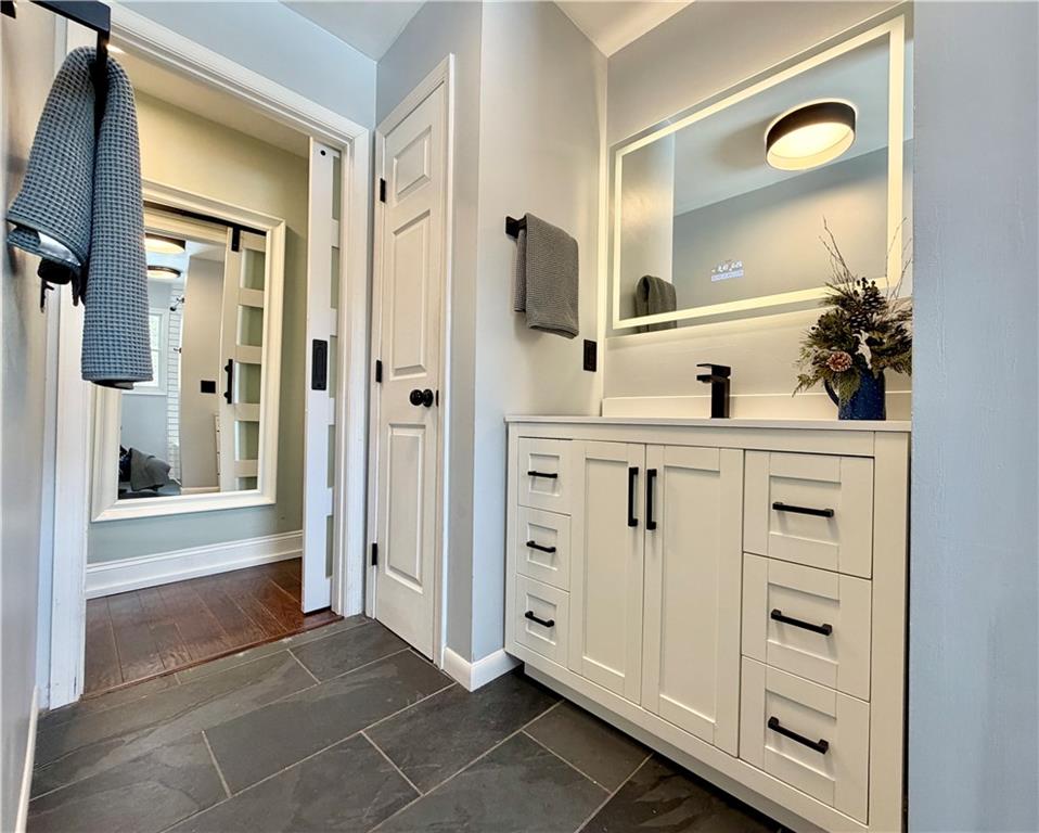 110 West McQuistion Road Butler, PA 16001 - Photo 8 of 32 a view of a walk in closet and bathroom