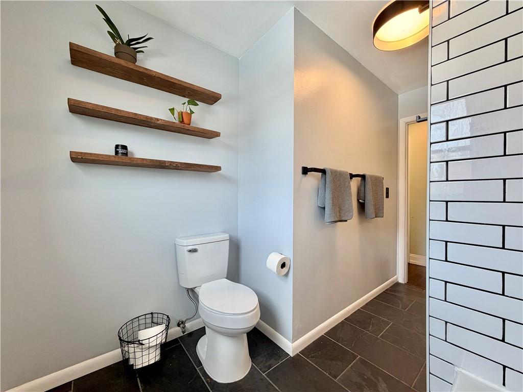 110 West McQuistion Road Butler, PA 16001 - Photo 9 of 32 a bathroom with a toilet and a shower