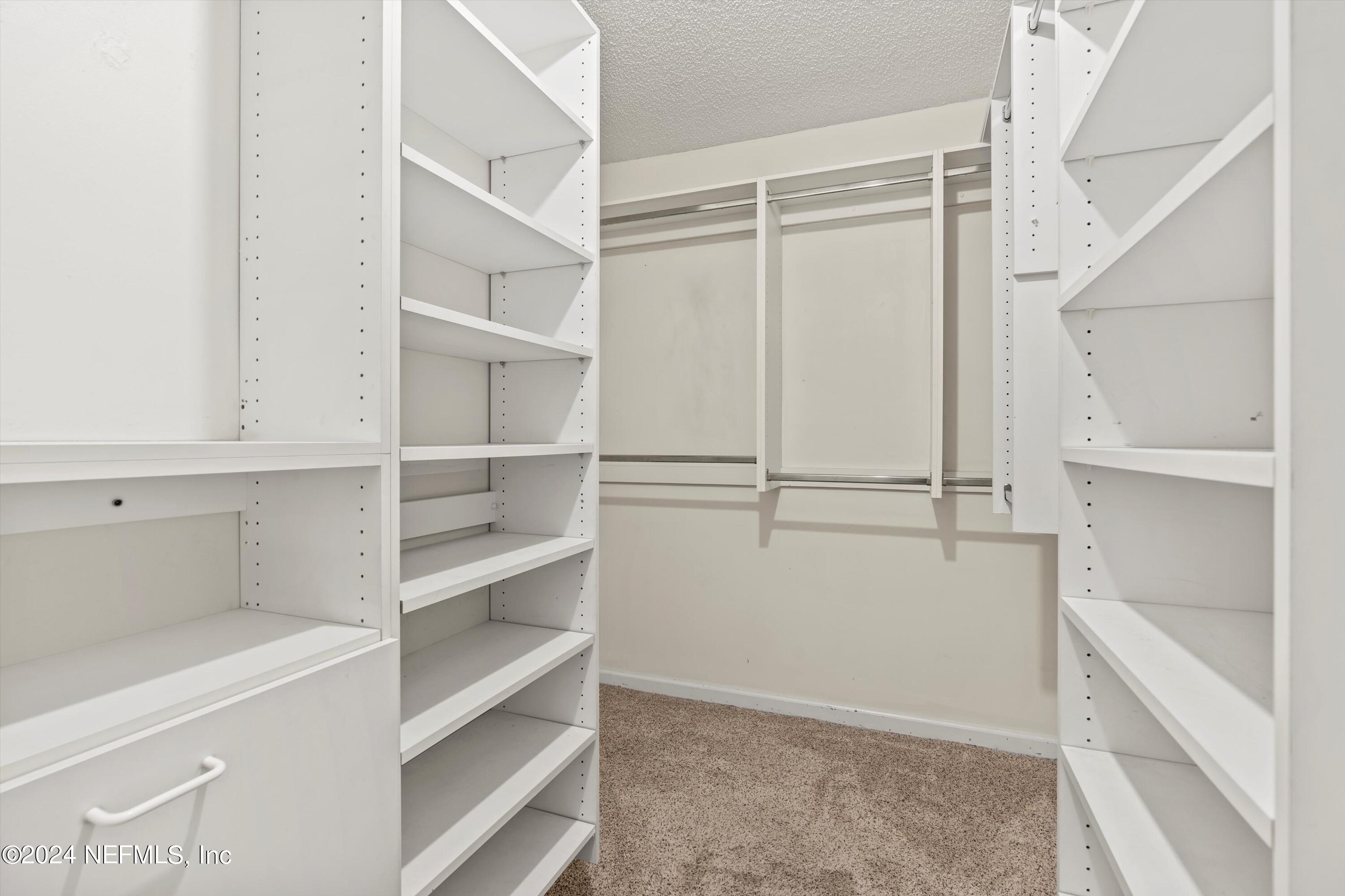 1474 Fruit Cove Forest Road North St. Johns, FL 32259 - Photo 22 of 36 a view of an empty walk in closet