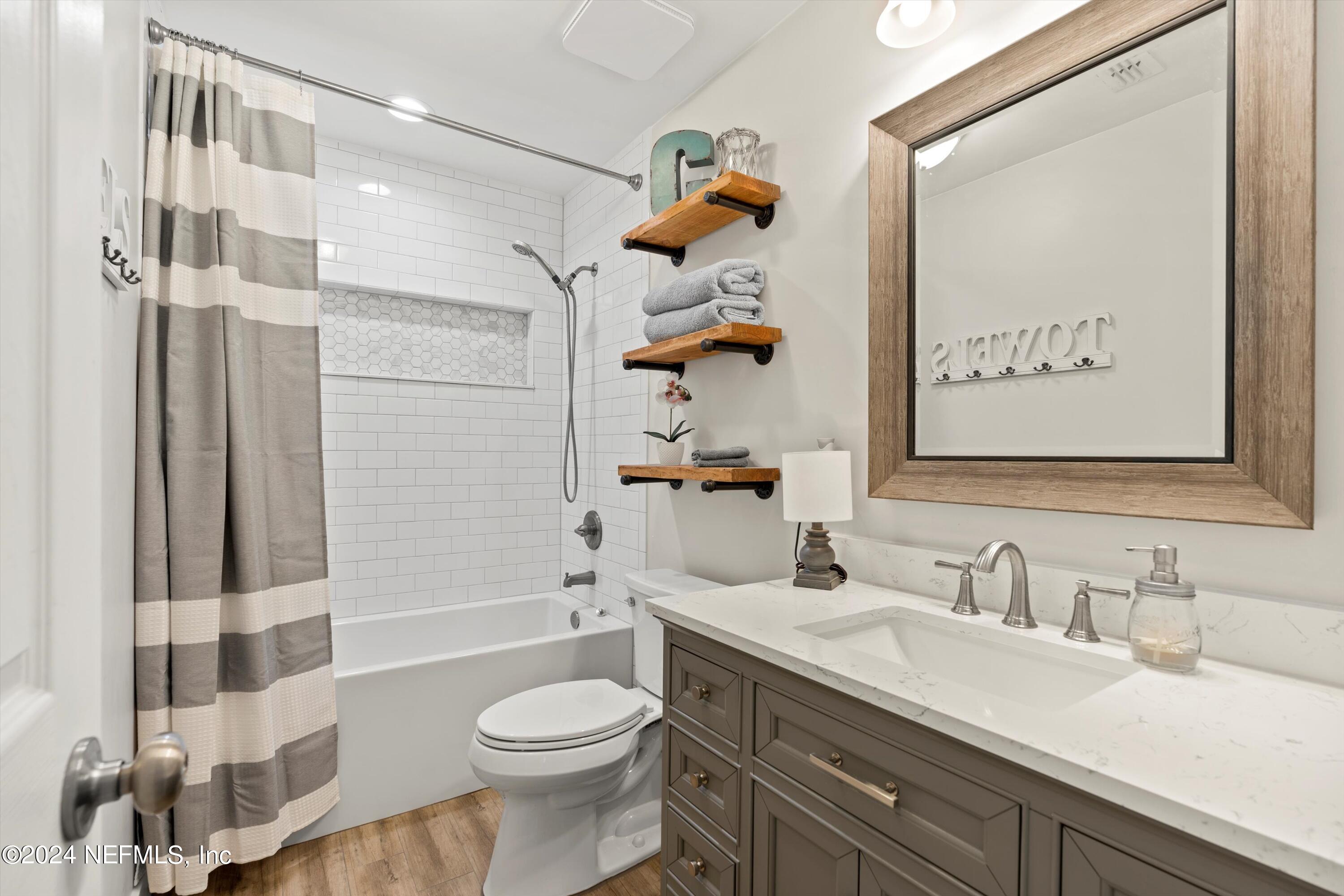 1474 Fruit Cove Forest Road North St. Johns, FL 32259 - Photo 24 of 36 a bathroom with a sink a toilet and shower