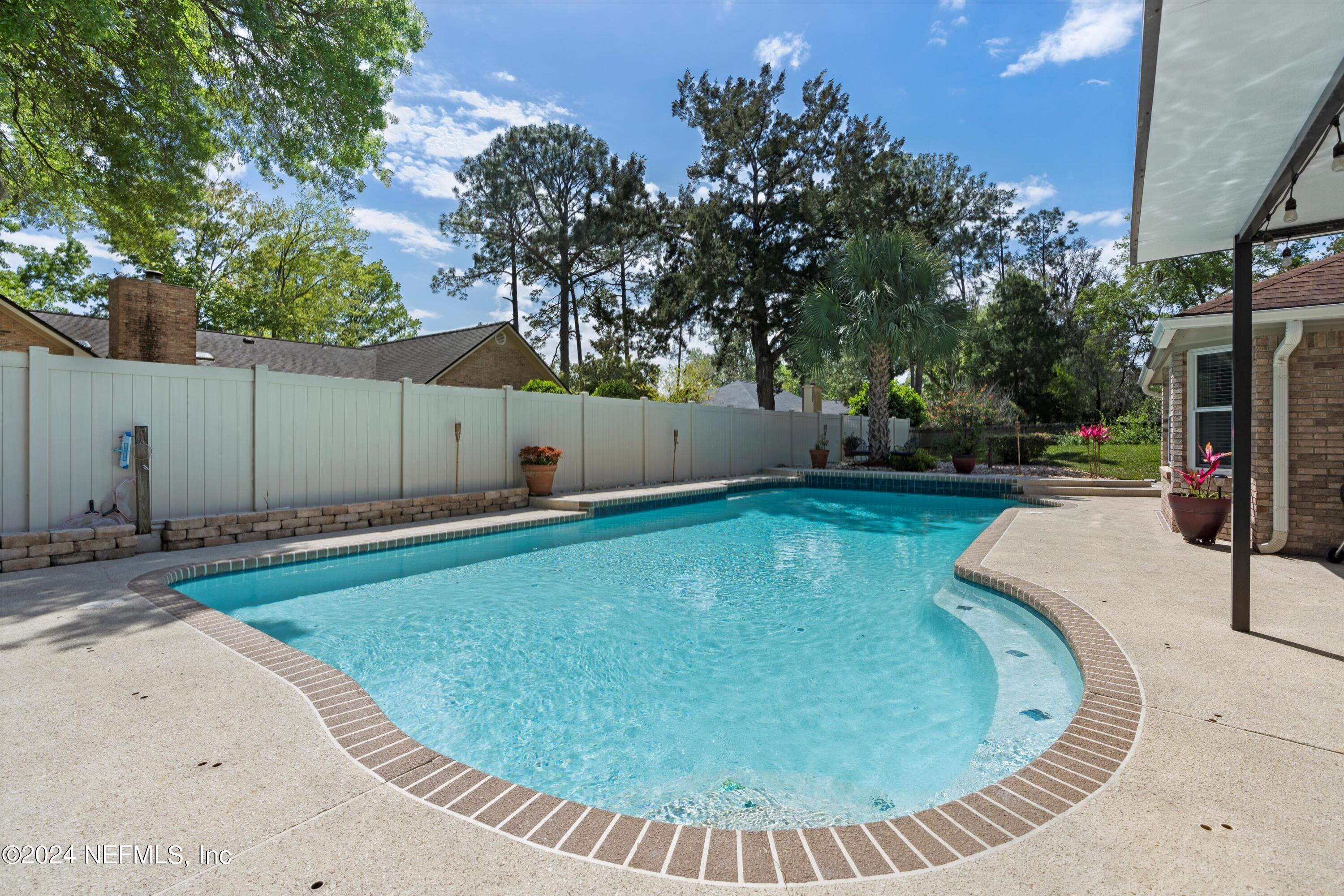 1474 Fruit Cove Forest Road North St. Johns, FL 32259 - Photo 29 of 36 a view of a backyard with a garden