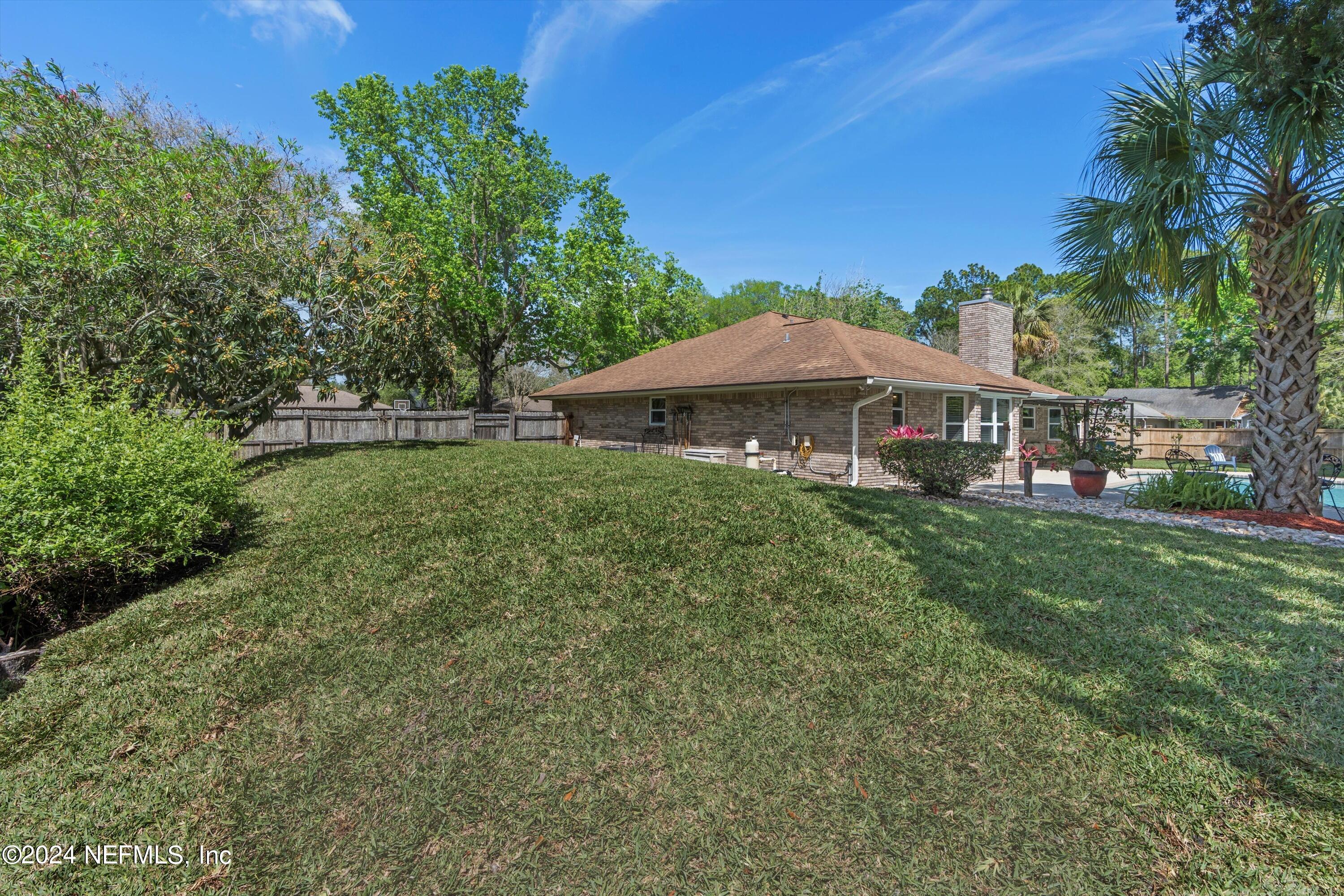 1474 Fruit Cove Forest Road North St. Johns, FL 32259 - Photo 31 of 36 a view of a house with a yard