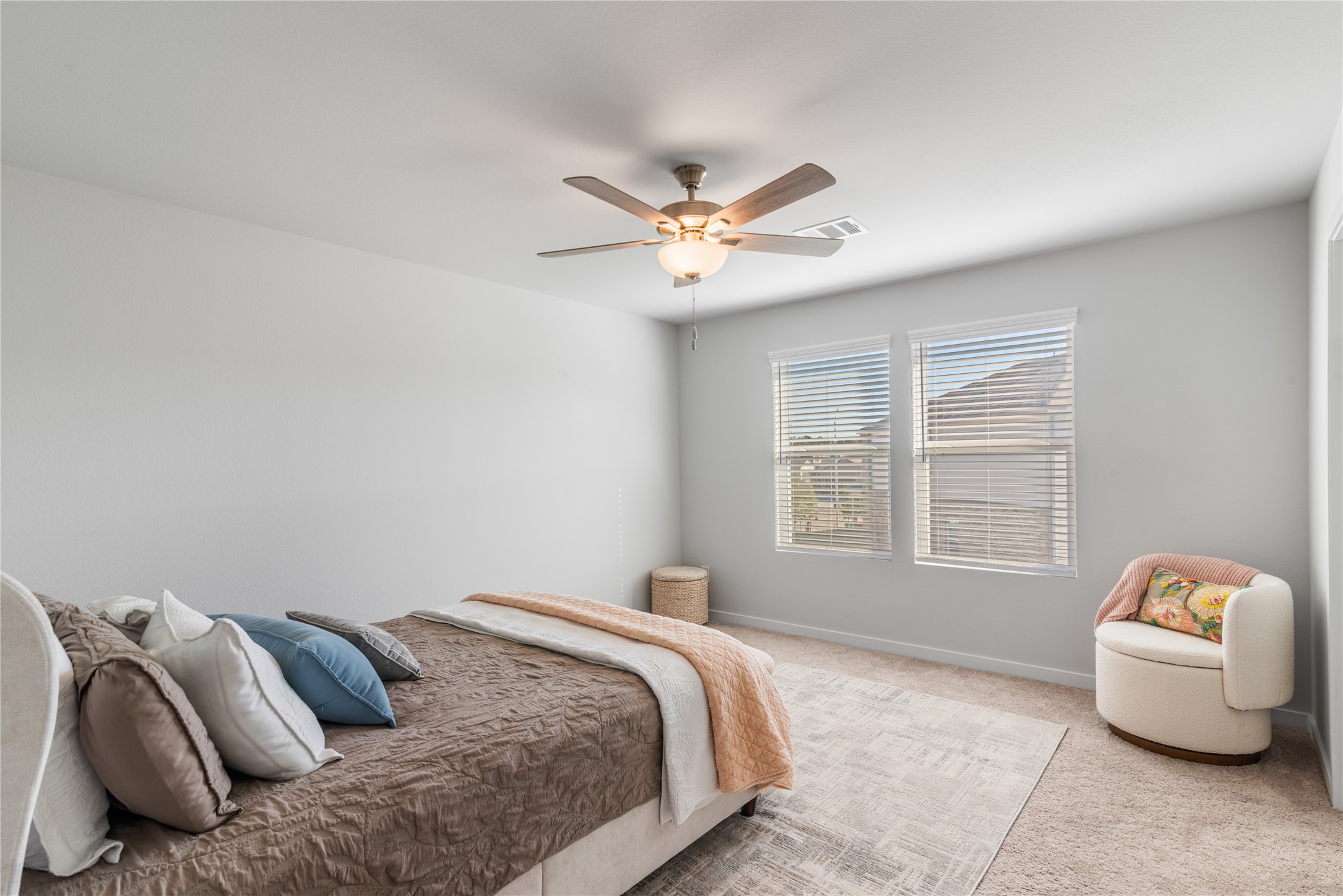 123 Alset Circle Magnolia, TX 77354 - Photo 15 of 27 a bedroom with a bed and a window