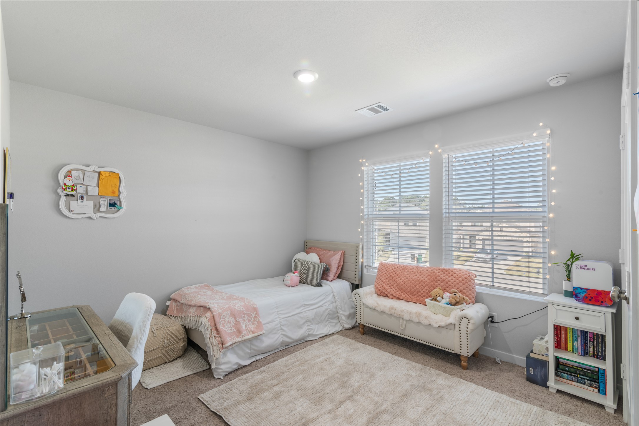 123 Alset Circle Magnolia, TX 77354 - Photo 18 of 27 a bedroom with a bed and a window