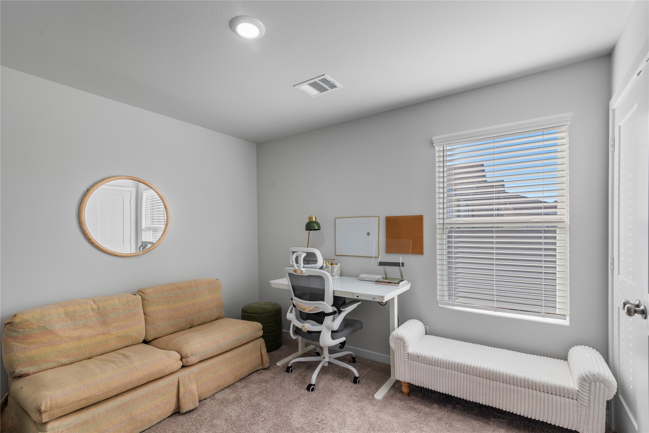 123 Alset Circle Magnolia, TX 77354 - Photo 24 of 27 a living room with a couch and a window