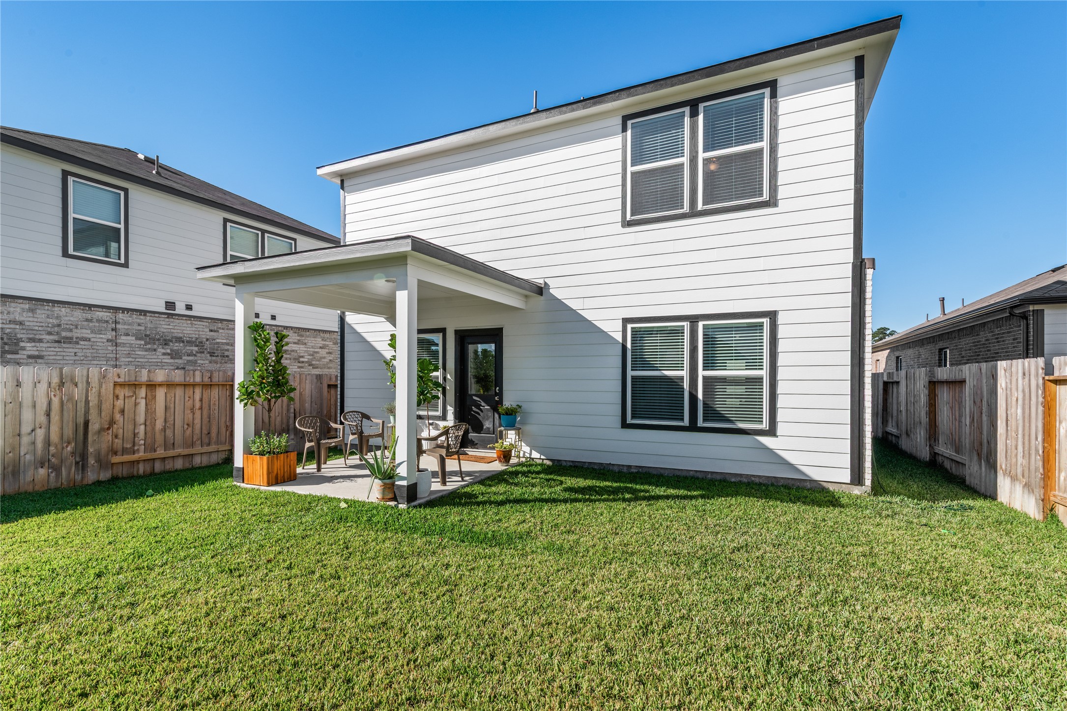 123 Alset Circle Magnolia, TX 77354 - Photo 26 of 27 a view of a house with backyard