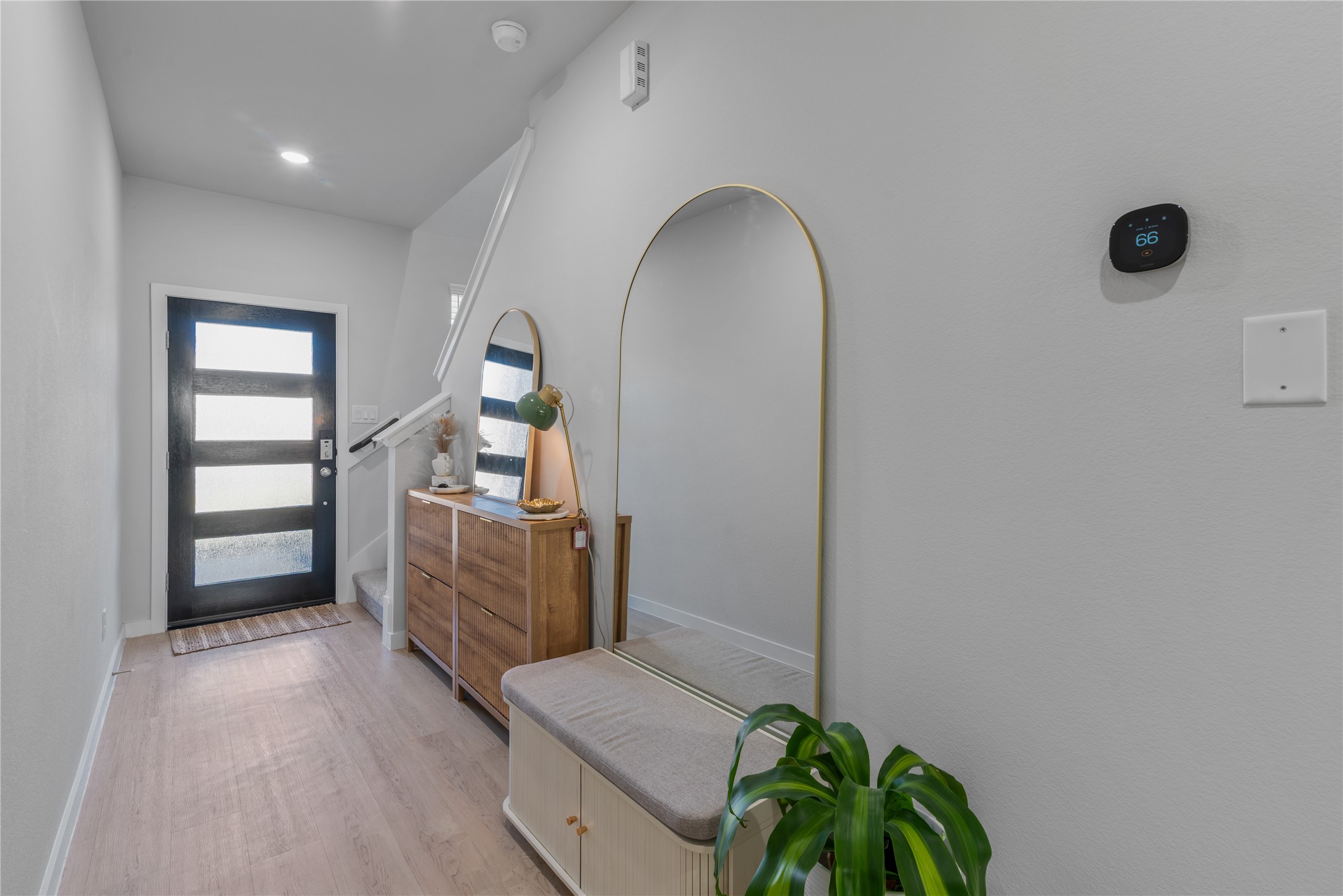 123 Alset Circle Magnolia, TX 77354 - Photo 4 of 27 a view of a hallway to a livingroom with furniture