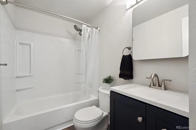 a view of workspace with furniture and a window