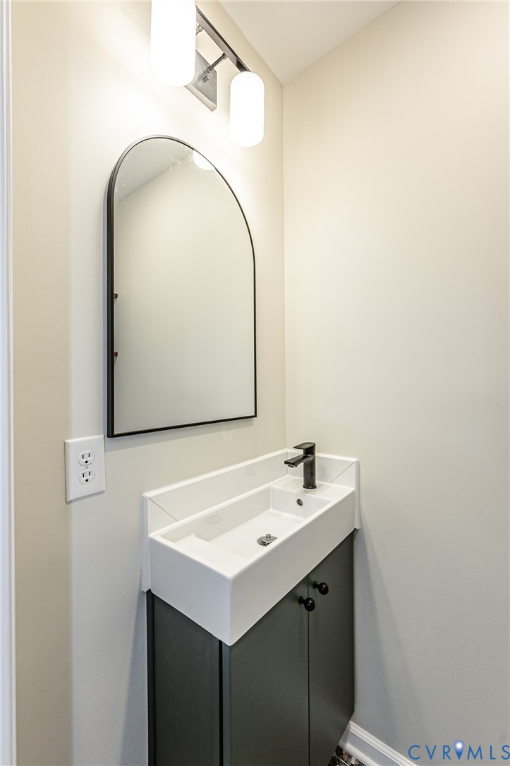 16110 Rowlett Road Chesterfield, VA 23838 - Photo 24 of 28 Half bath in Bedroom 1 with new sink and toilet