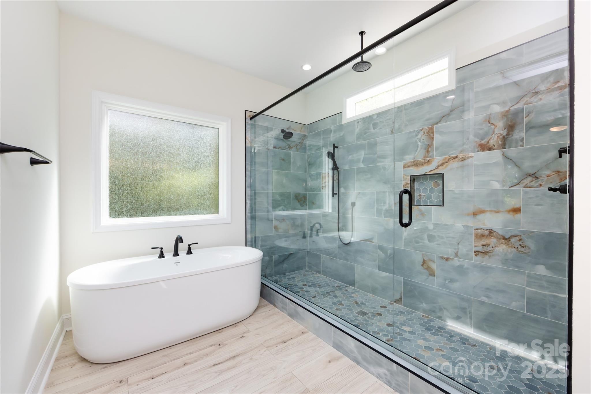 240 Doster Road Lancaster, SC 29720 - Photo 16 of 31 a bathroom with a bathtub and a shower