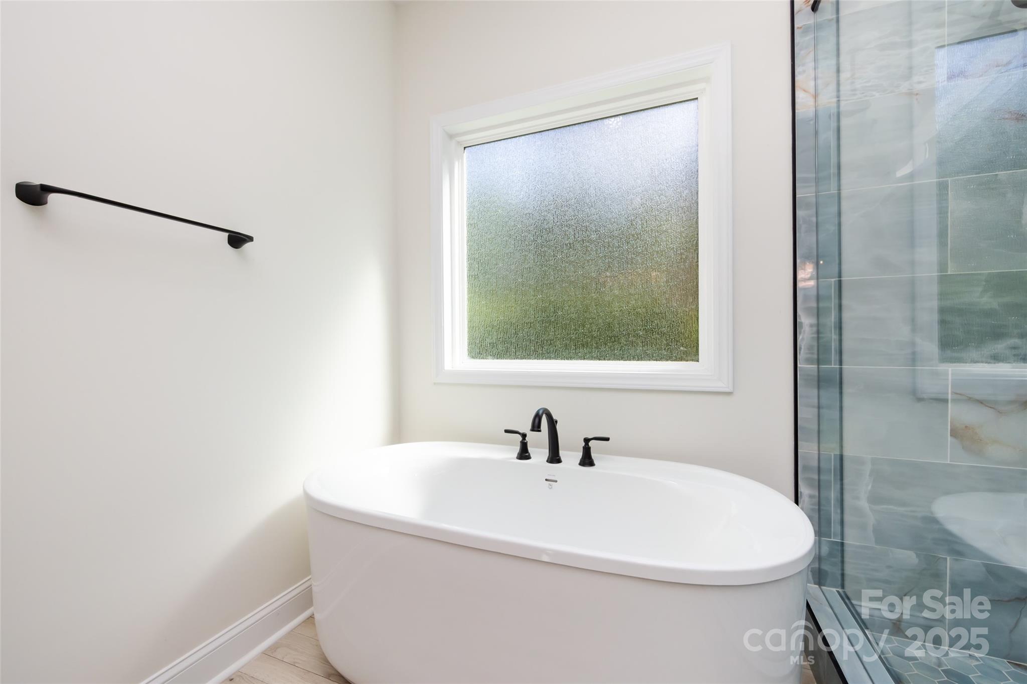 240 Doster Road Lancaster, SC 29720 - Photo 17 of 31 a white toilet sitting next to a bathroom sink