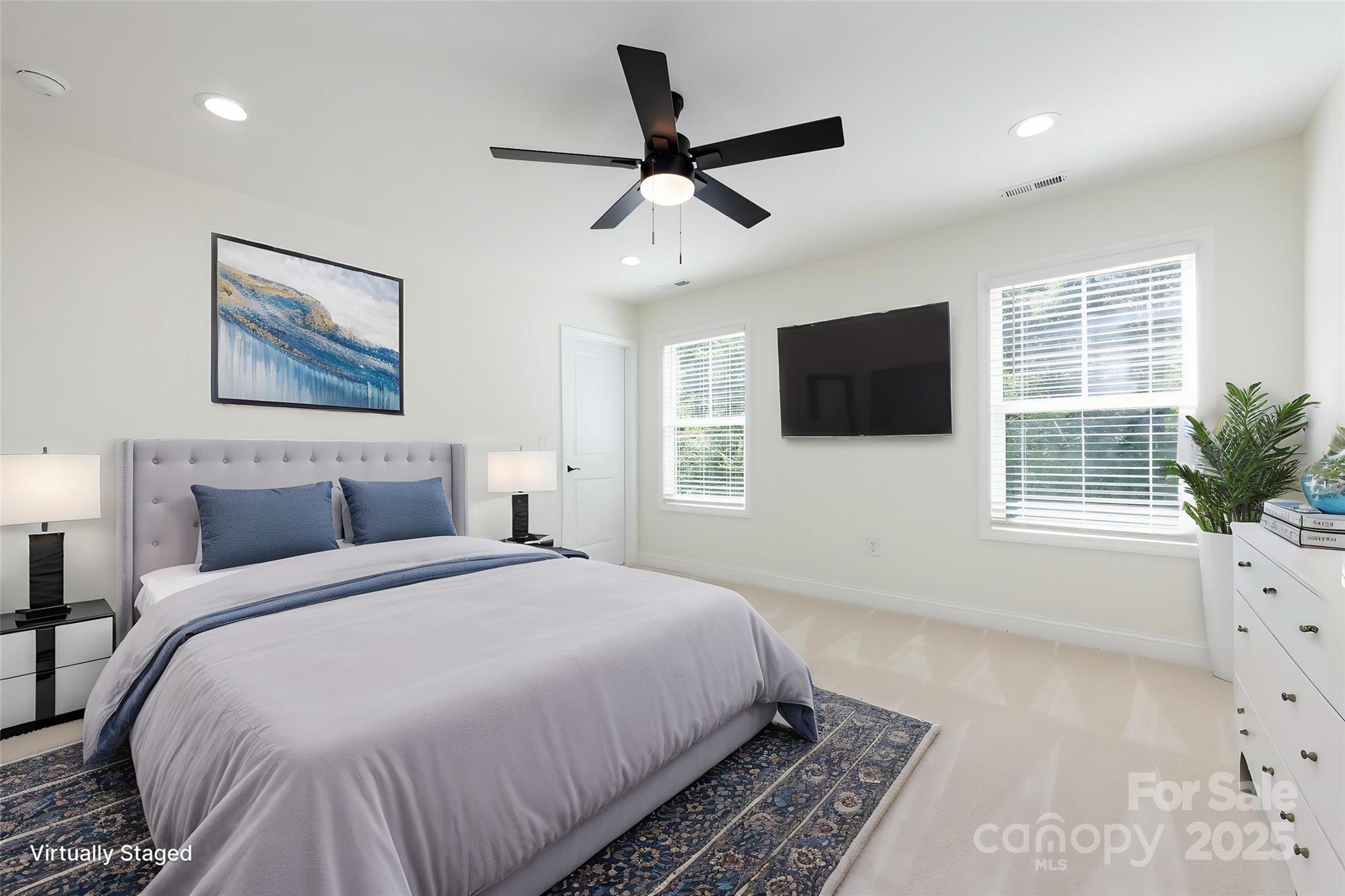 240 Doster Road Lancaster, SC 29720 - Photo 19 of 31 a bedroom with a bed a window and a flat screen tv