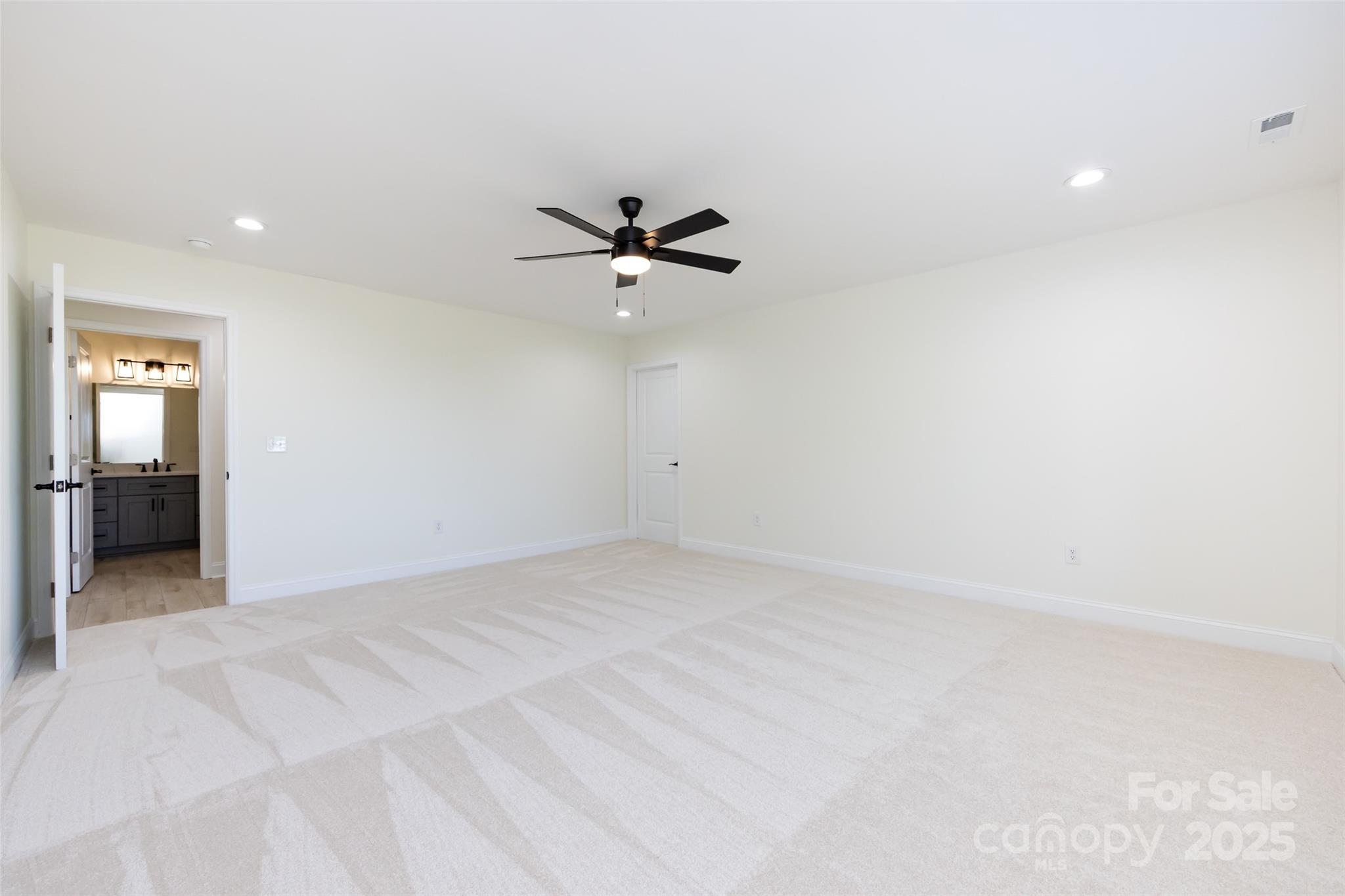 240 Doster Road Lancaster, SC 29720 - Photo 23 of 31 an empty room with a ceiling fan and a window