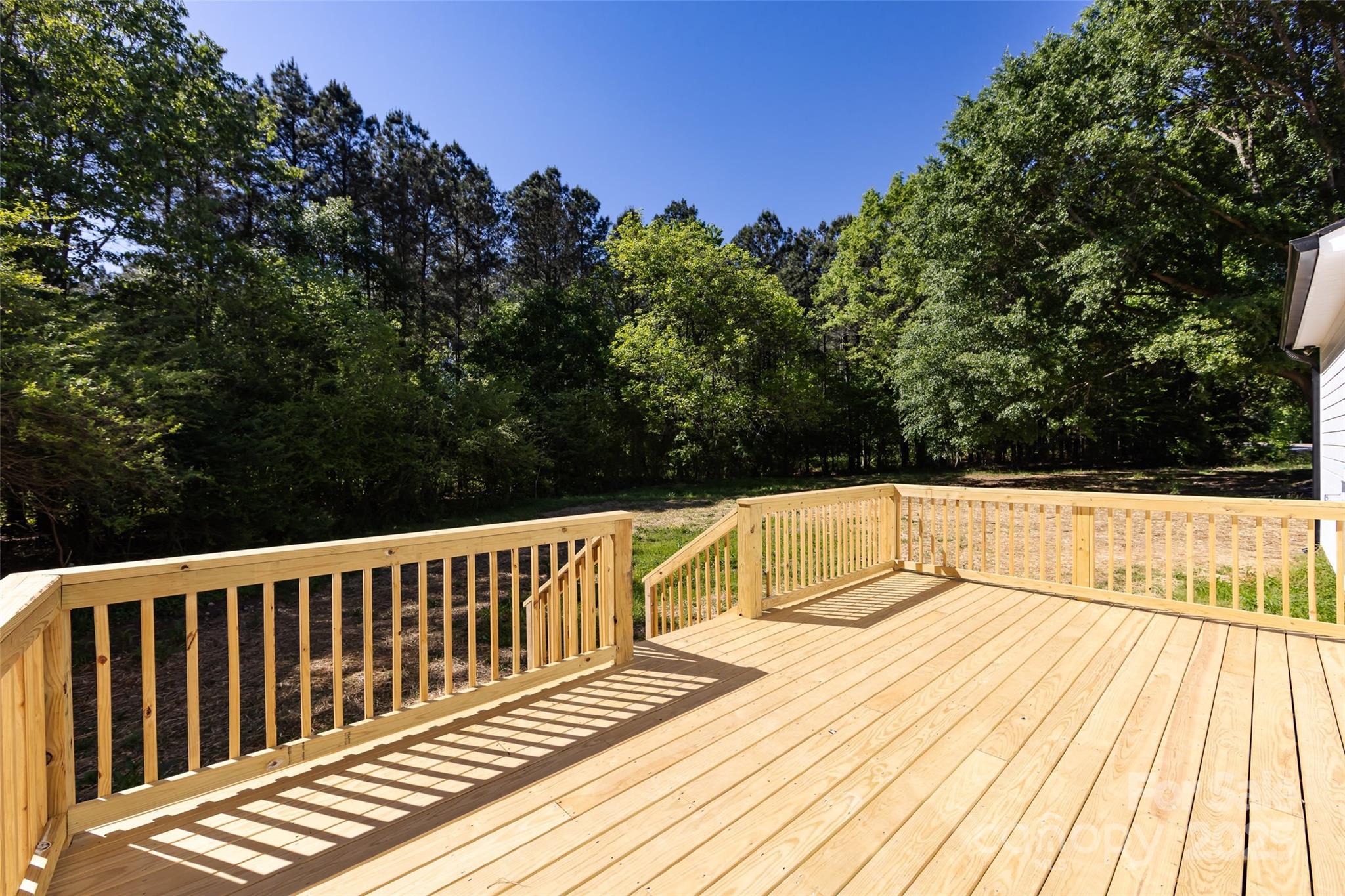240 Doster Road Lancaster, SC 29720 - Photo 26 of 31 a view of balcony with wooden floor and fence