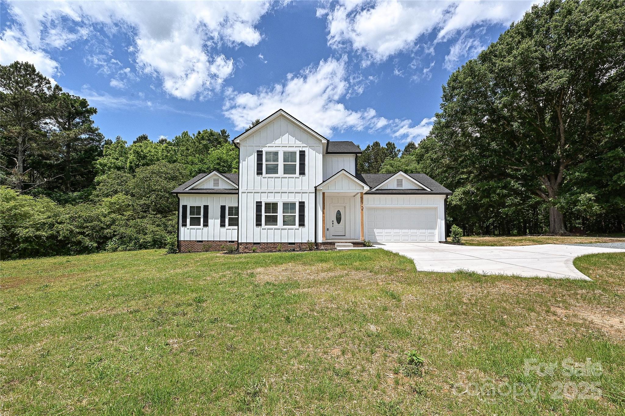 240 Doster Road Lancaster, SC 29720 - Photo 28 of 31 a front view of a house with a yard