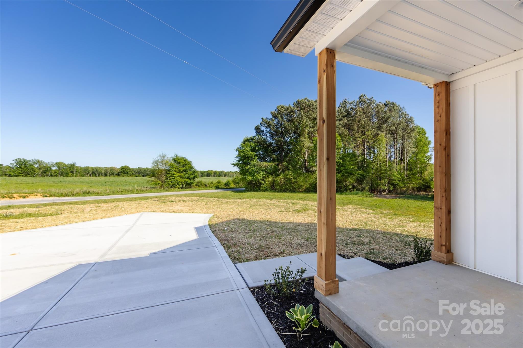 240 Doster Road Lancaster, SC 29720 - Photo 30 of 31 a view of a yard with an outdoor seating