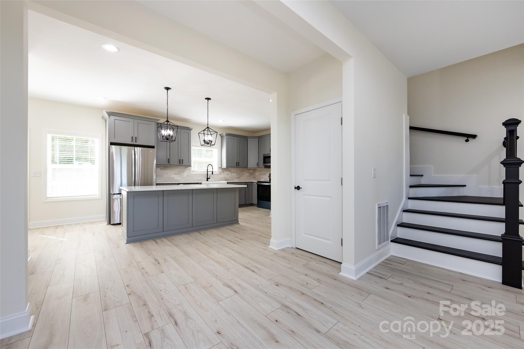 240 Doster Road Lancaster, SC 29720 - Photo 5 of 31 a view of kitchen with wooden floor and electronic appliances