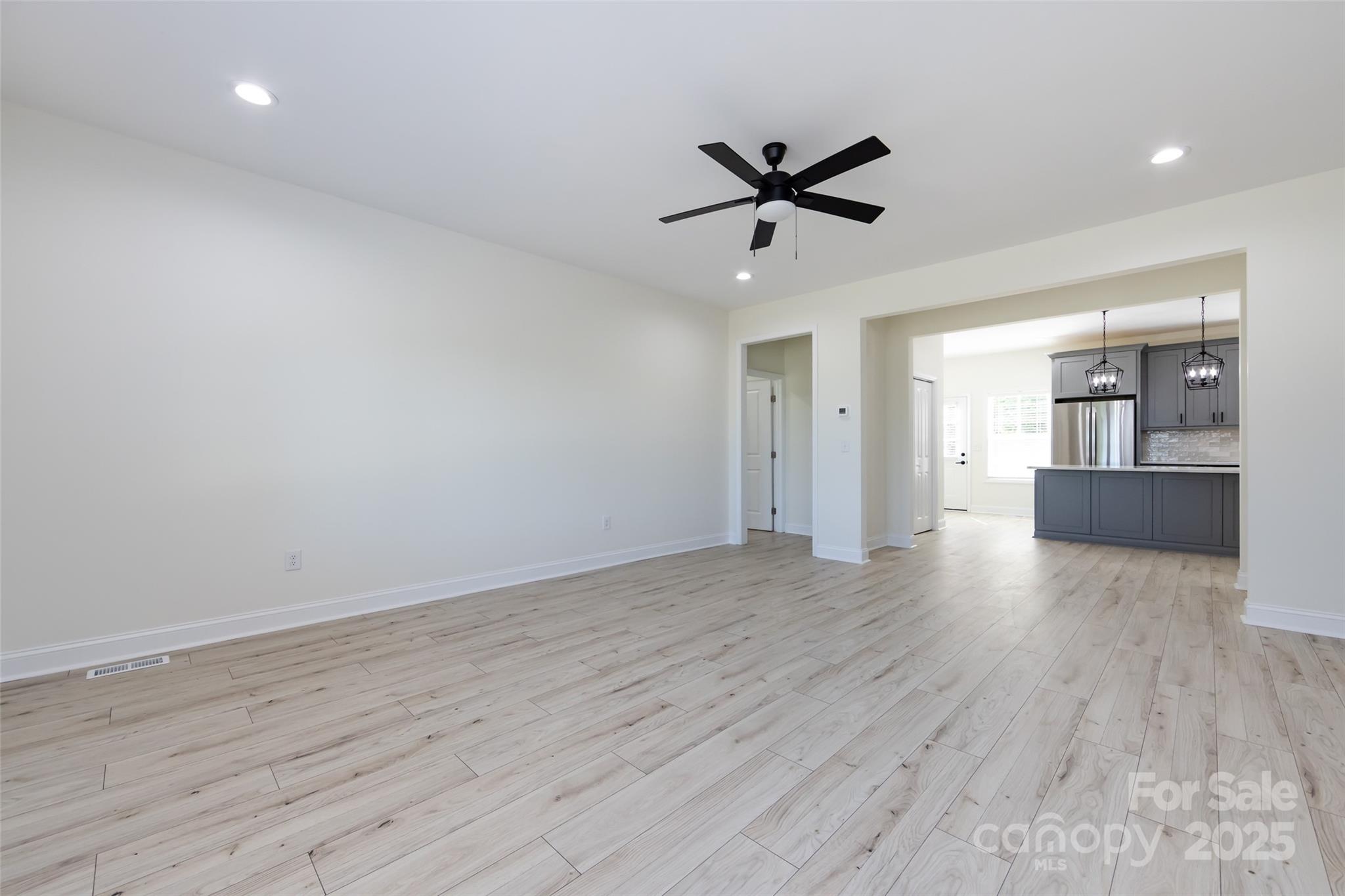 240 Doster Road Lancaster, SC 29720 - Photo 9 of 31 a view of empty room with wooden floor and window