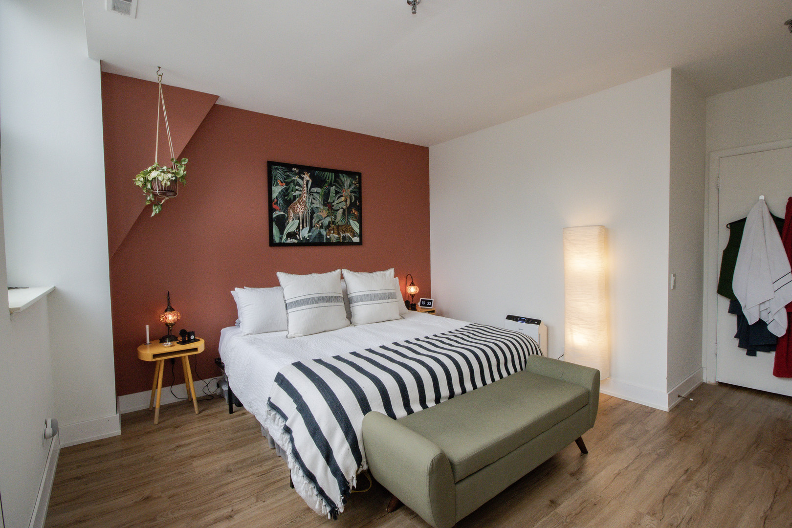 740 South Federal Street, Unit 1204 Chicago, IL 60605 - Photo 10 of 14 a bedroom with a bed and a flat screen tv